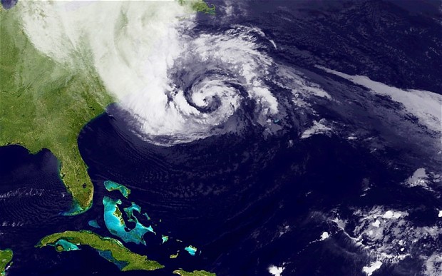 Breaking News! Hurricane Sandy Hits The East Coast Hard; Building Collapses in New York City @Barackobama Issues A Statement (video inside)