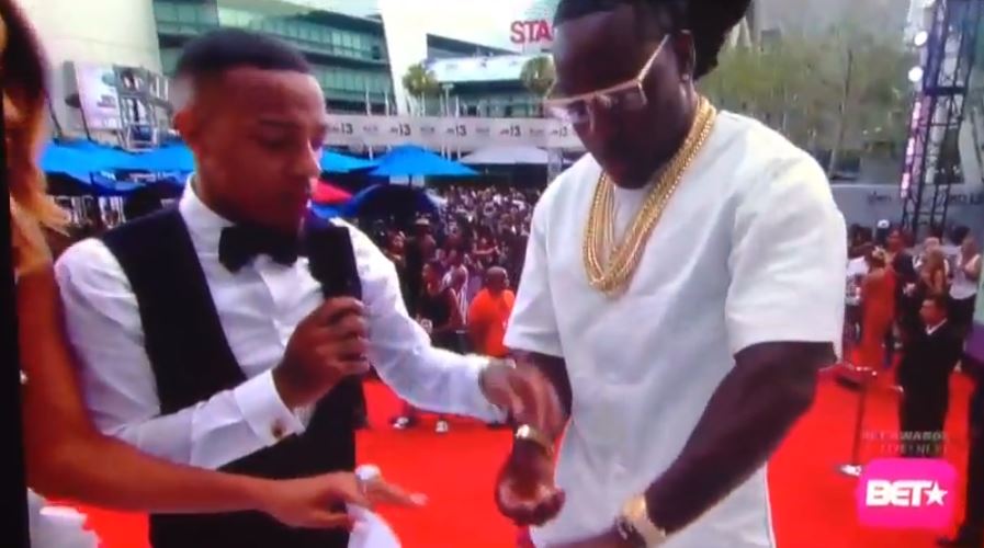 Fake It Till You Make It: Ace Hood’s Gold Bezel “Rolex” Watch Falls Apart On Live TV During BET Awards Interview [Video]