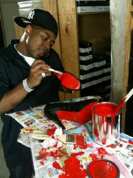Photo of the Day! Ladies, Did You Purchase Your Red Bottoms from this Dude?