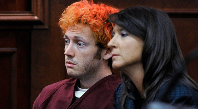 Breaking News!! “The Joker” Mass Murder Suspect Charged with 24 Counts of 1st Degree Murder